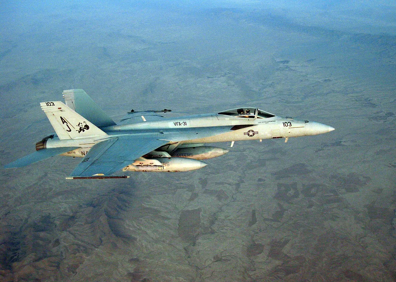 A U.S. Navy F/A-18 Super Hornet of Strike Fighter Squadron 31 flying over Afghanistan.