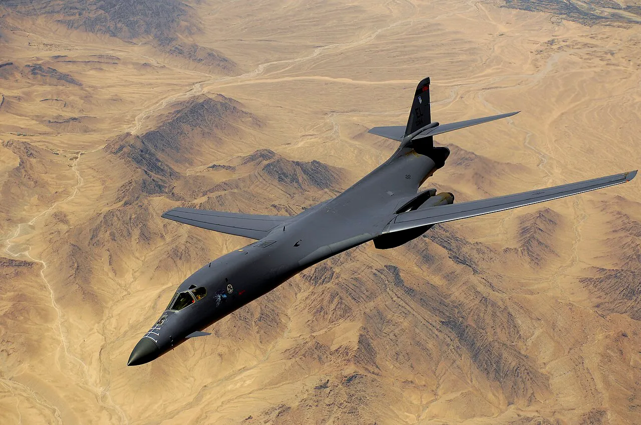 A B-1B Lancer bomber moves out of position after receiving fuel from a KC-135R tanker during a mission over Afghanistan.