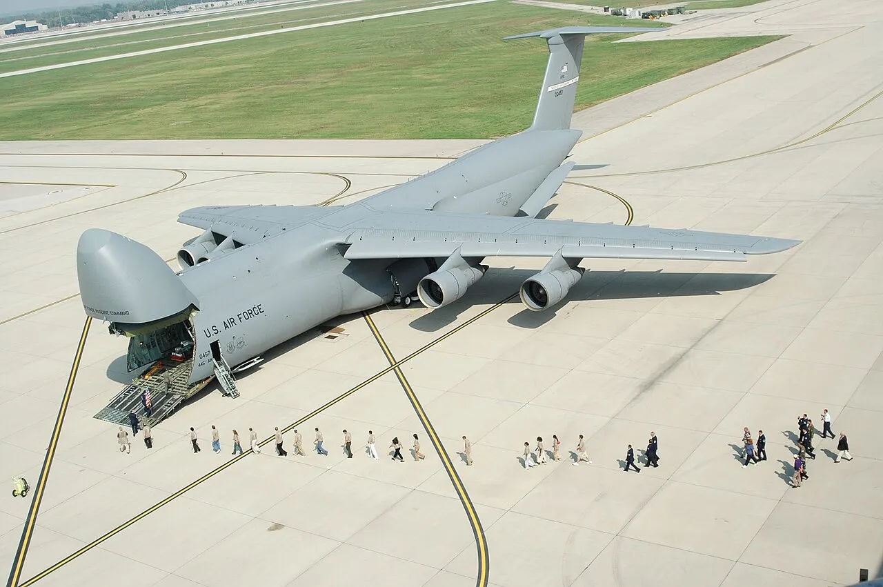 People line up to enter a U.S. Air Force C-5A Galaxy at Wright-Patterson Air Force Base, Ohio.