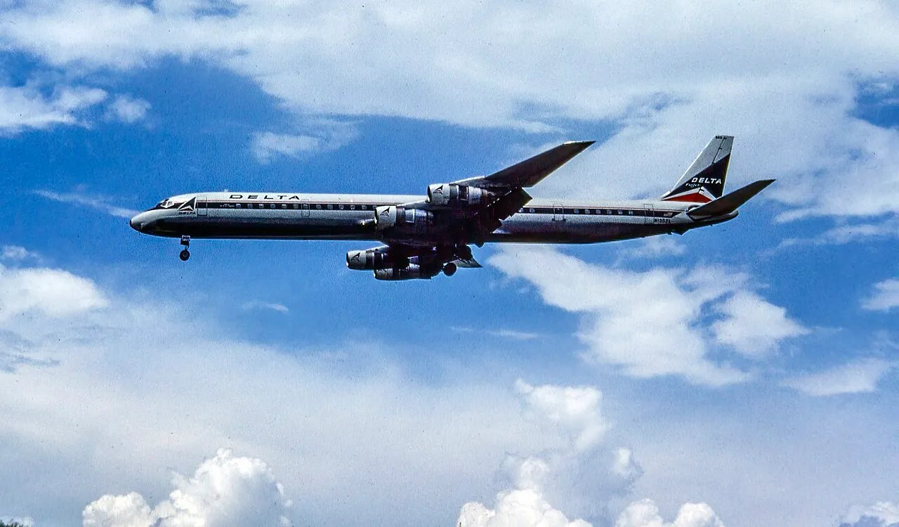 A Delta Air Lines Douglas DC-8-62 on approach with gear down at Atlanta's Hartsfield airport.