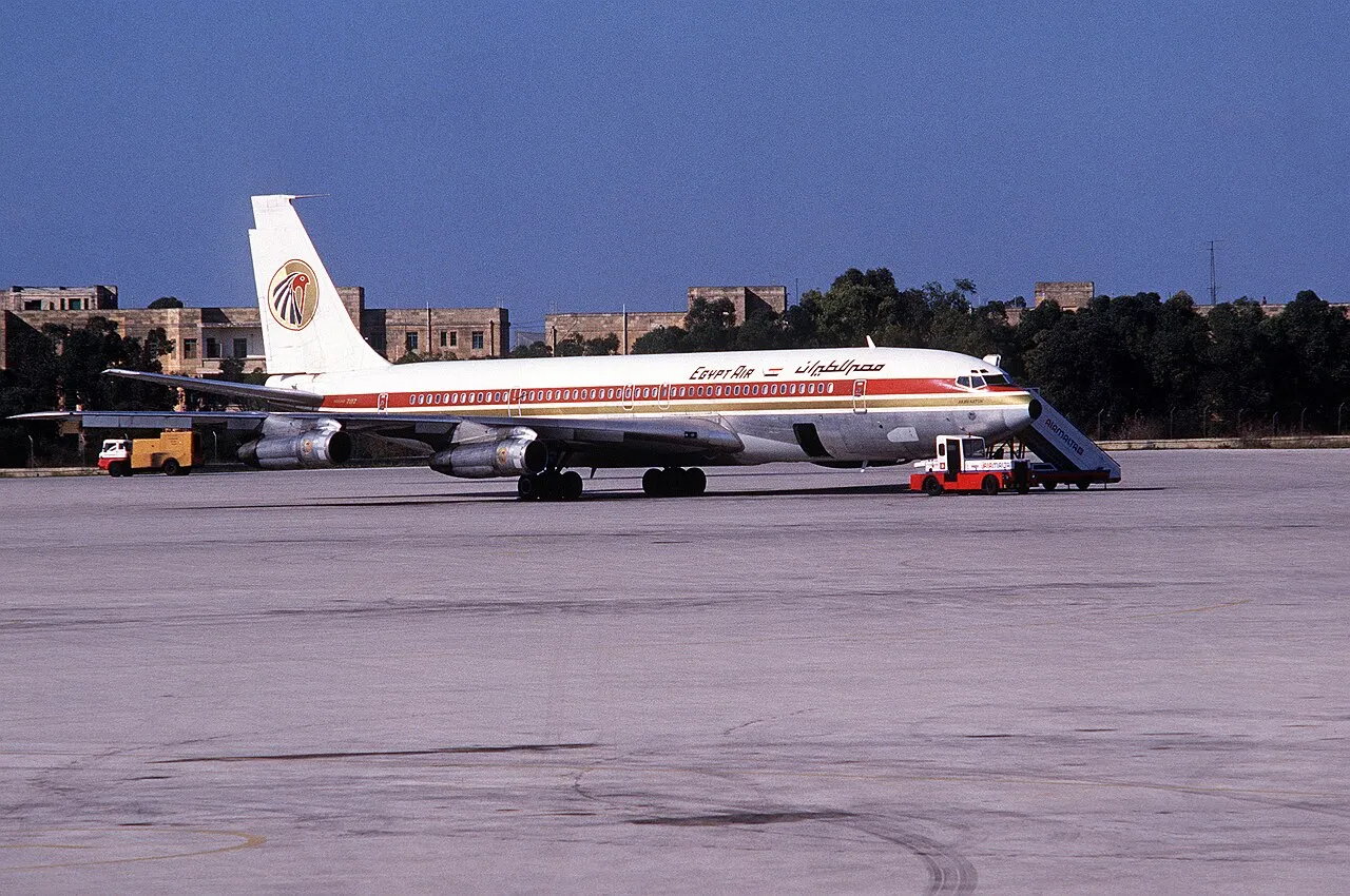 An Egypt Air Boeing 707 passenger jet parked on the ramp at Luqa Airport, Malta, in 1985.