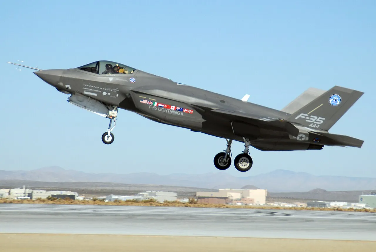 An F-35 Lightning II test aircraft climbing after takeoff at Edwards Air Force Base, California.