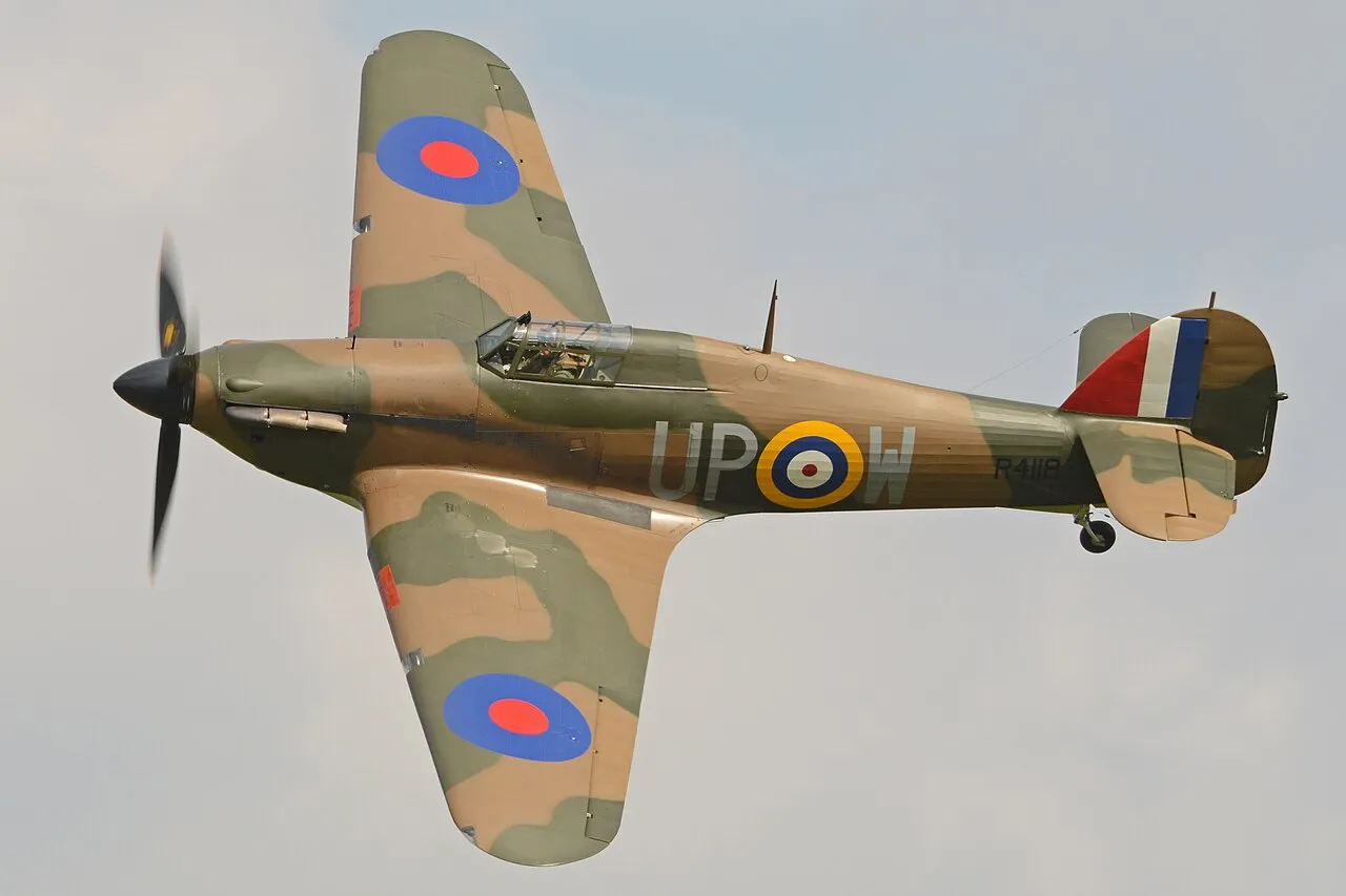Hawker Hurricane Mk I 'R4118', a Battle of Britain veteran, in flight at an airshow.