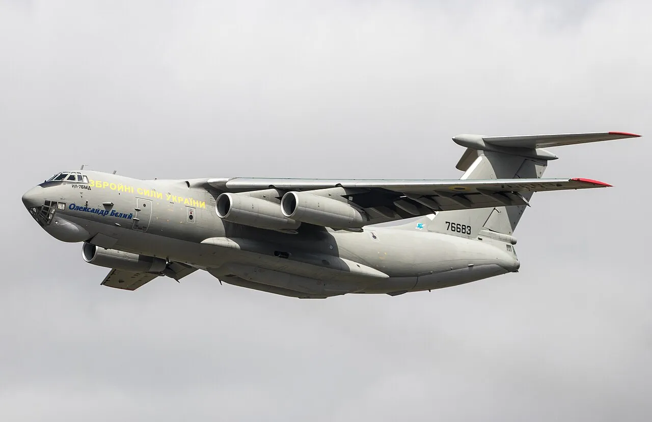 An Ilyushin Il-76MD military transport aircraft of the Ukrainian Air Force parked on the tarmac at an airshow.