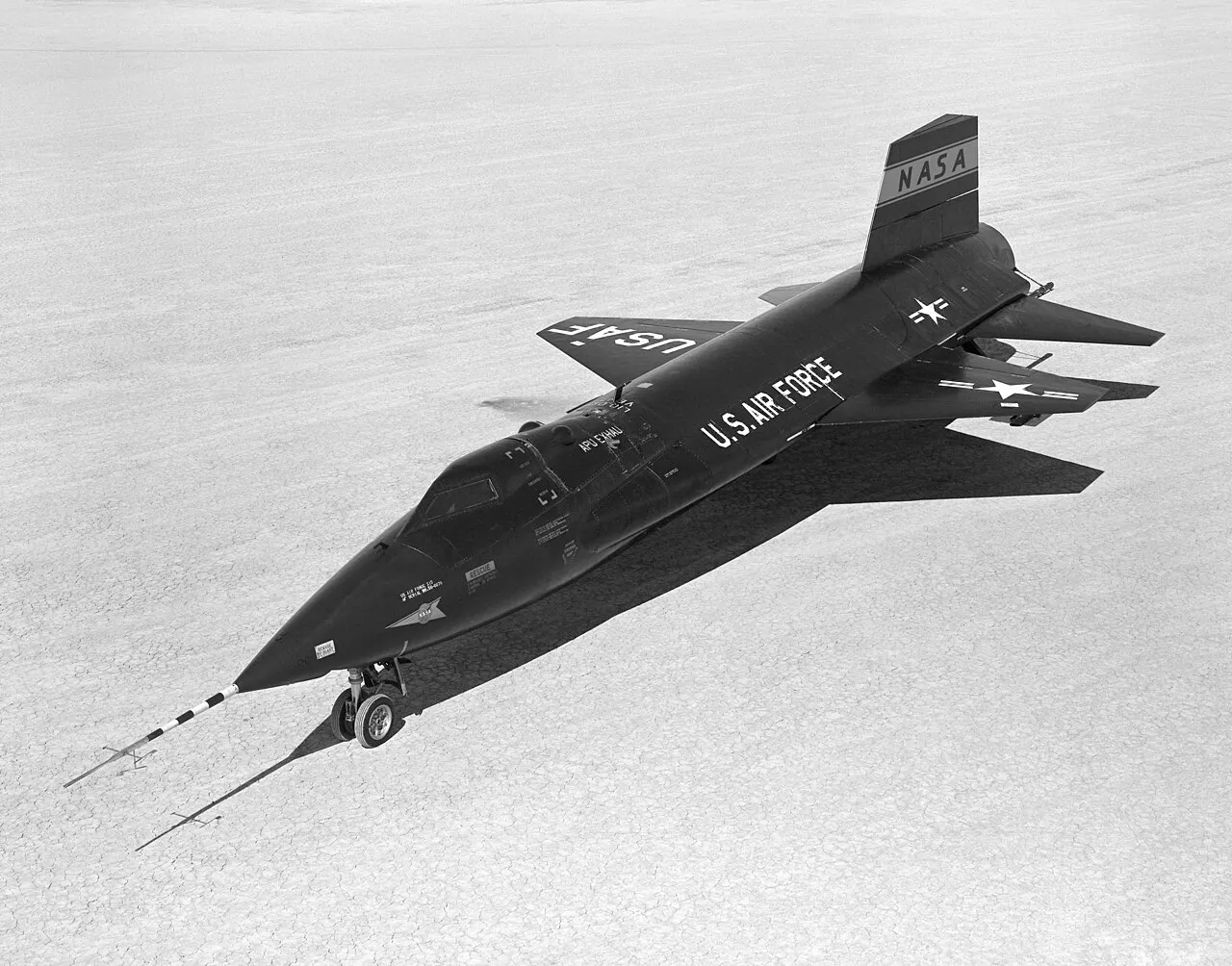 The North American X-15 rocket plane, ship #1 (56-6670), resting on a dry lakebed during its flight research programme.