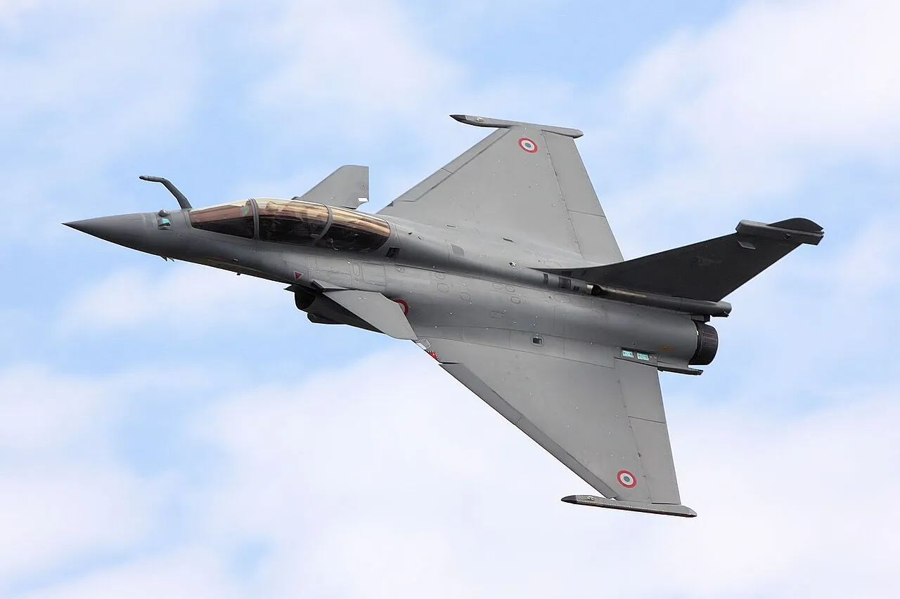 A Dassault Rafale fighter jet seen from above in flight, in French military grey camouflage, at the 2009 Royal International Air Tattoo.