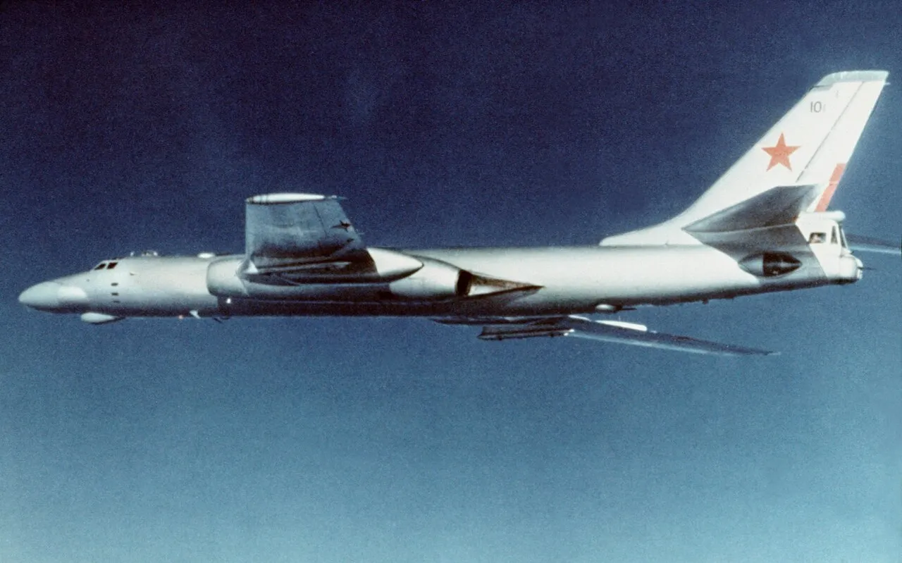 A twin-jet Soviet Tu-16 Badger bomber with swept wings, photographed in flight in 1984.