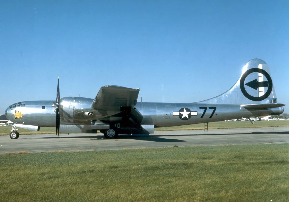 The USAF Boeing B-29 Superfortress Bockscar on static display, its silver fuselage and four-engine wing visible.